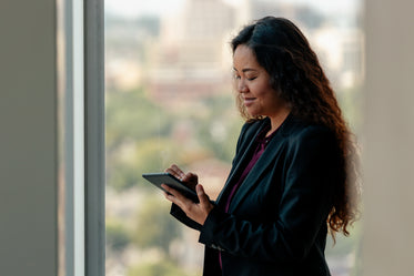 Browse Free HD Images of Business Woman With Ipad And Stylus