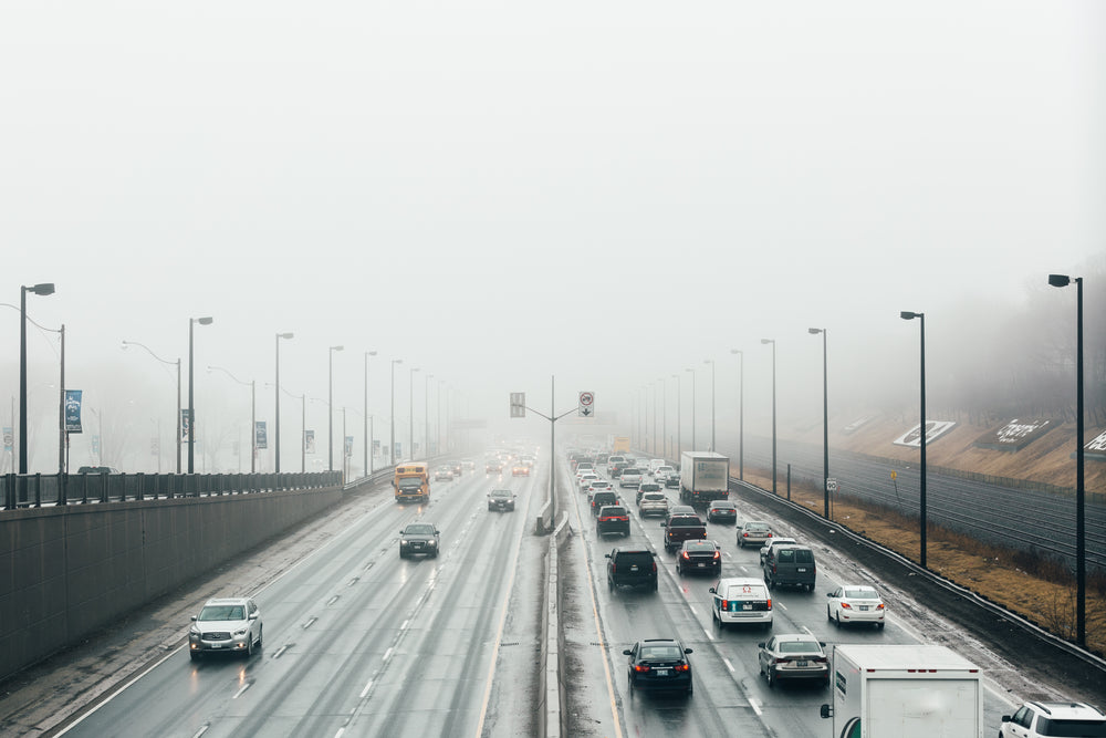 busy freeway in the fog