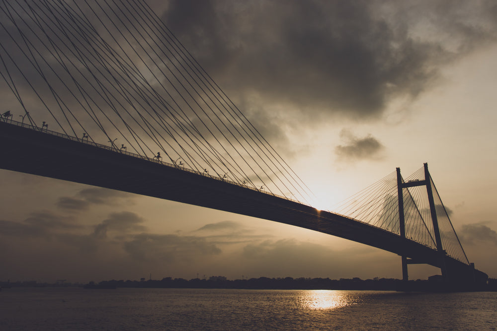 cable bridge at sunset