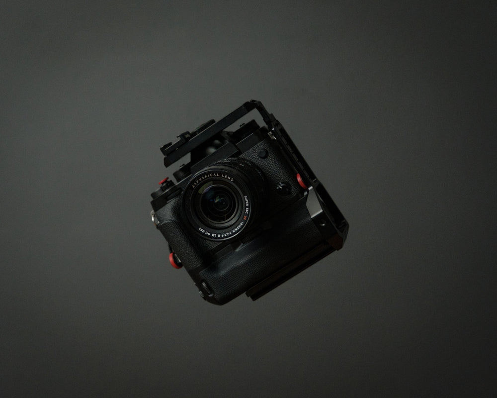 camera floating on grey background