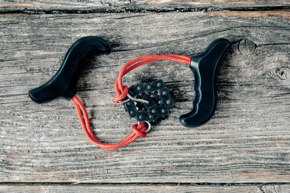 camping pocket chainsaw flatlay