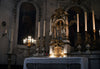 candle-lit church altar