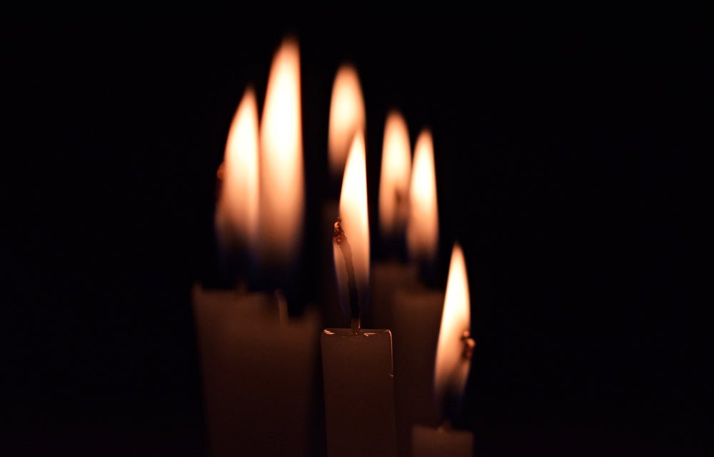 candles lit in dark