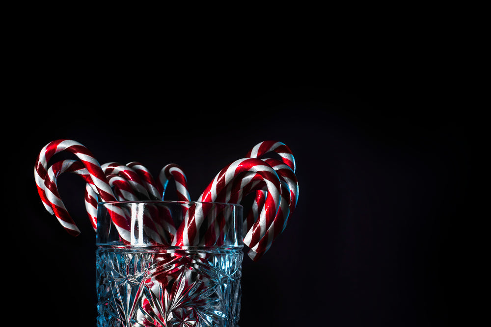 candy canes in crystal glass