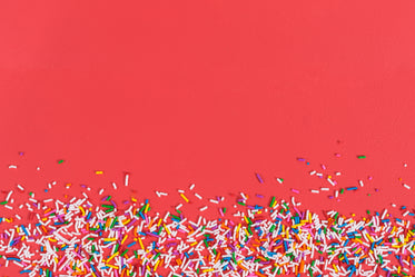 candy sprinkle red background