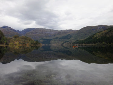 canoe over glassy lake