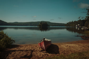 canoe resting on small beach