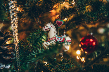 carousel horse ornament on tree