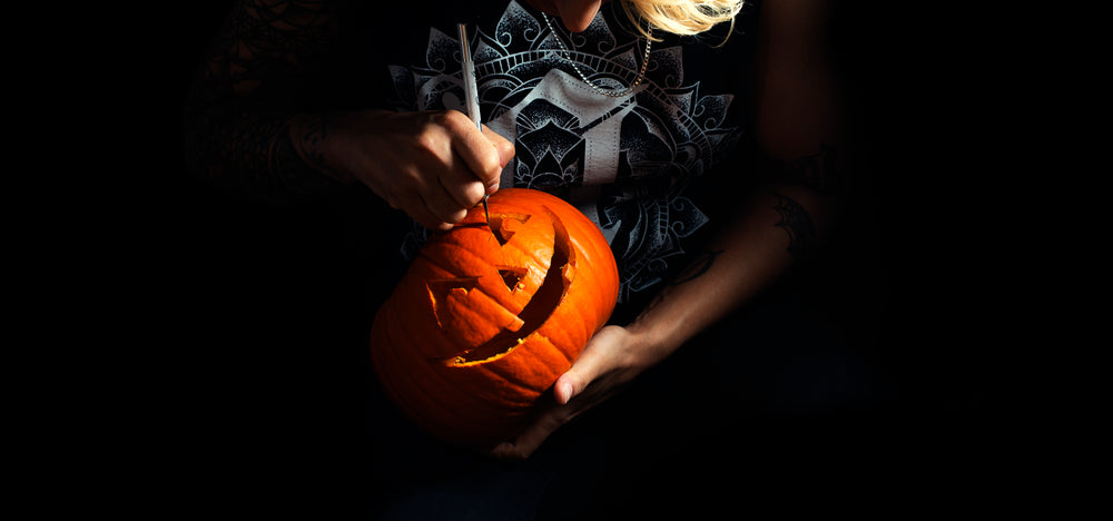 carving a festive jack o lantern