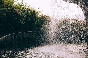 cascading water splashes into a fountains pool