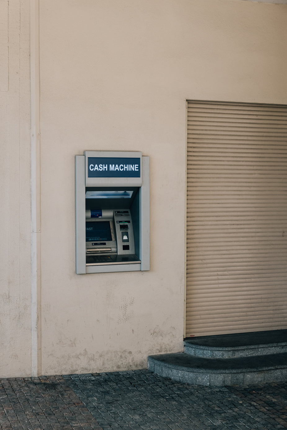 High Res Cash Machine On A Beige Wall Picture — Free Images
