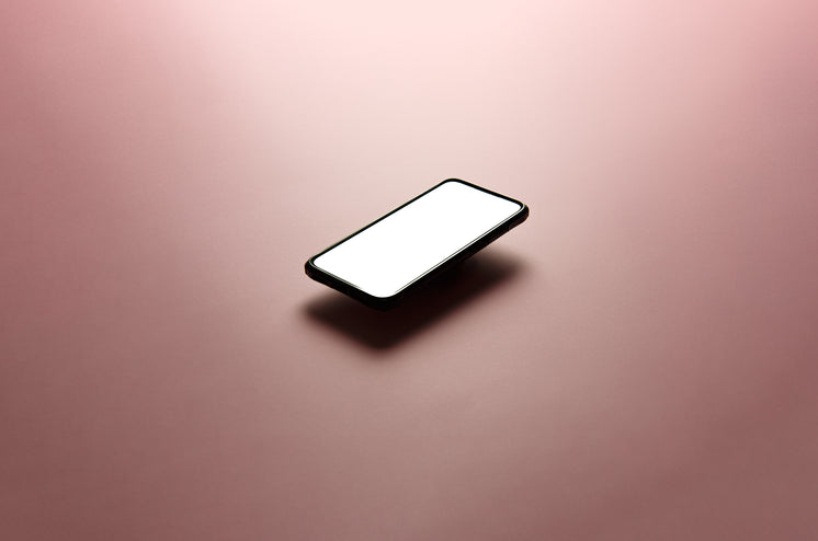cellphone-floats-above-a-soft-pink-backg