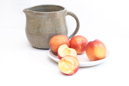ceramic jug with fruit