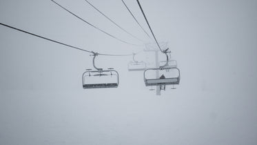 chairlift in a white winter storm