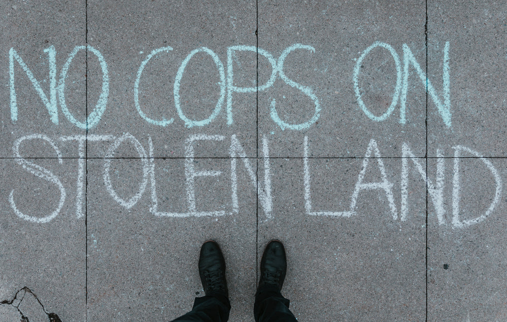 chalk lettering on concrete path