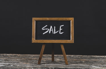 chalkboard sale sign in wood frame