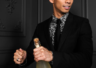 champagne bottle in hand