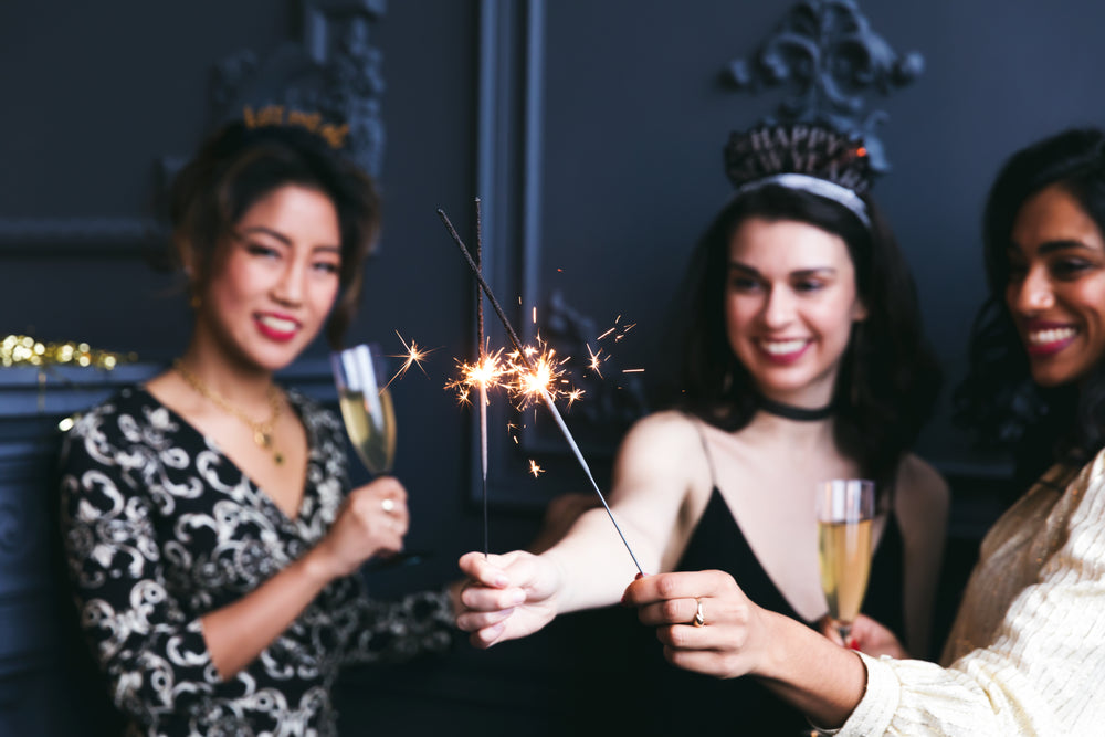 champagne toast over sparklers