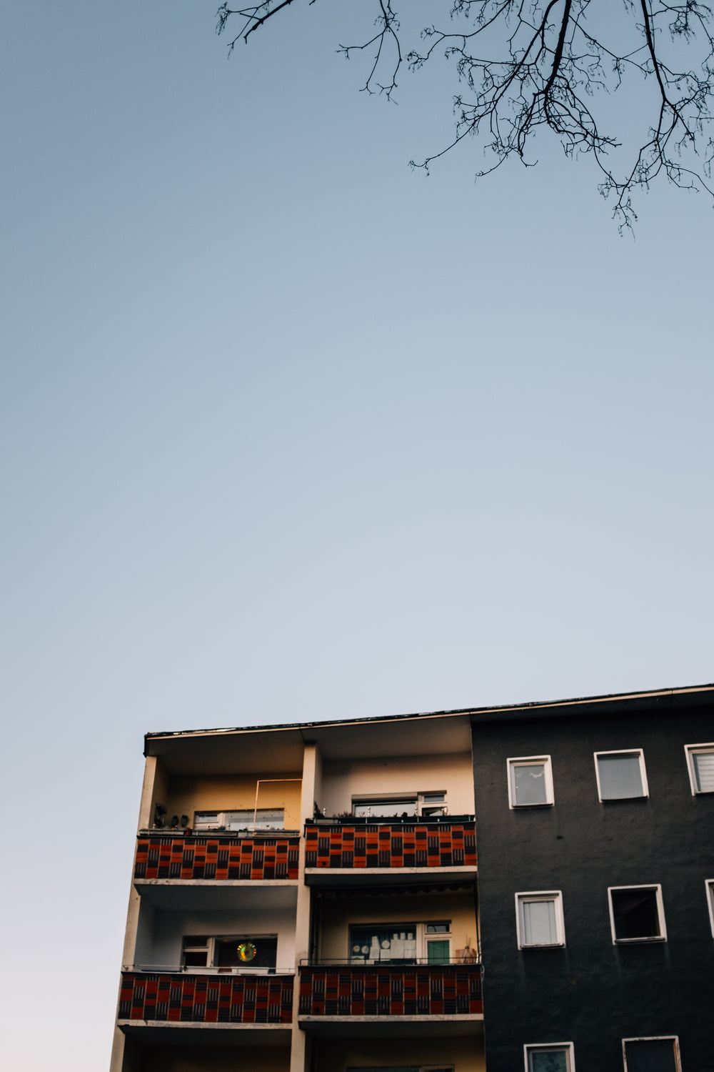 checkered balcony railings and black walls