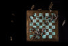 chess board with fallen pieces
