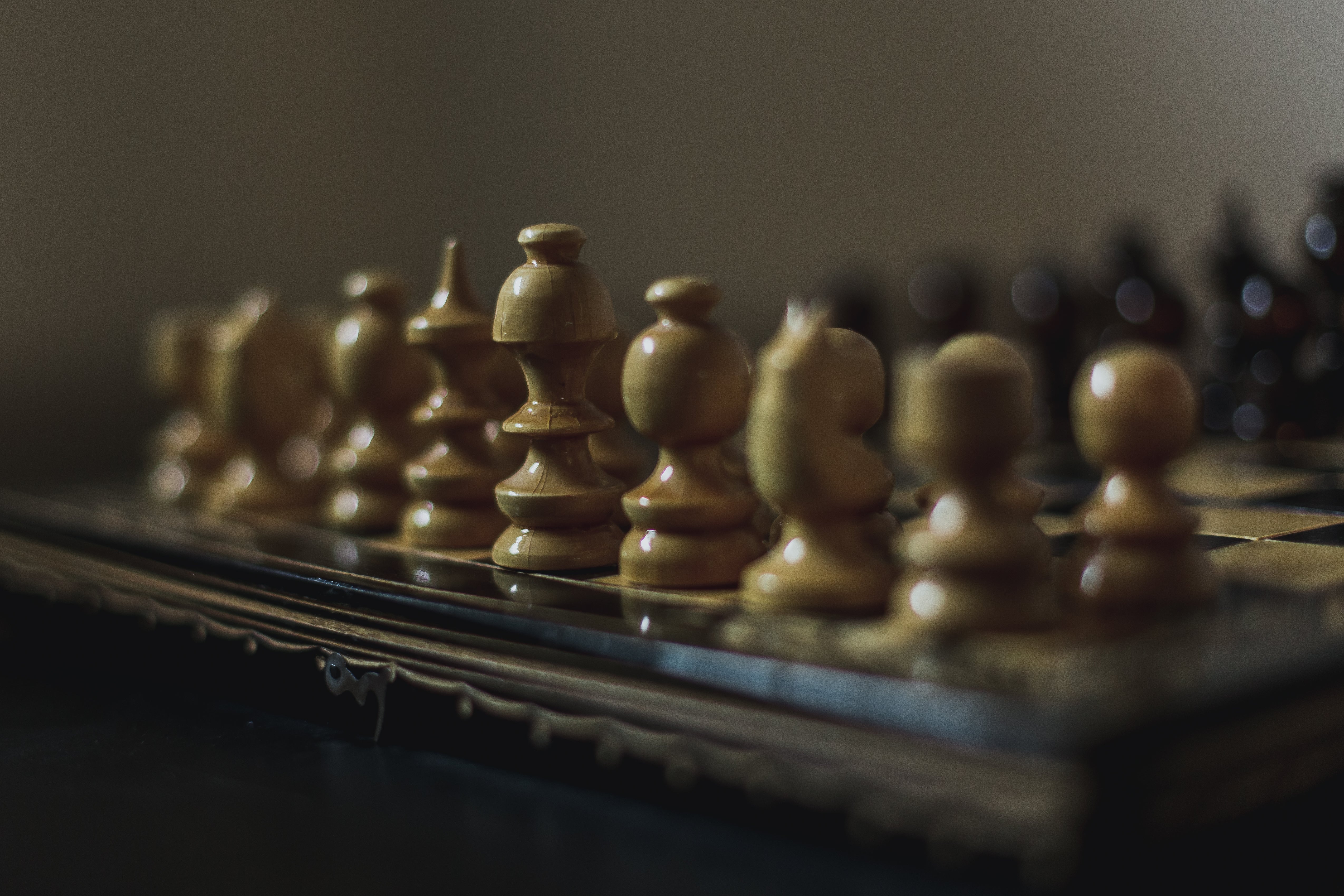 Browse Free HD Images of Dark Wooden Chess Pieces Against A Black Background