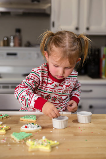 child baking at christmas