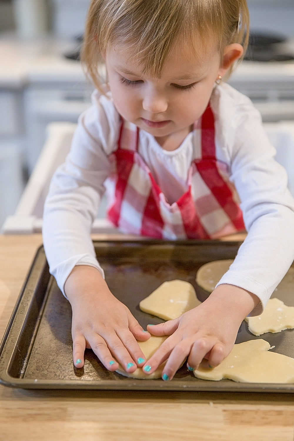 child preps cookies