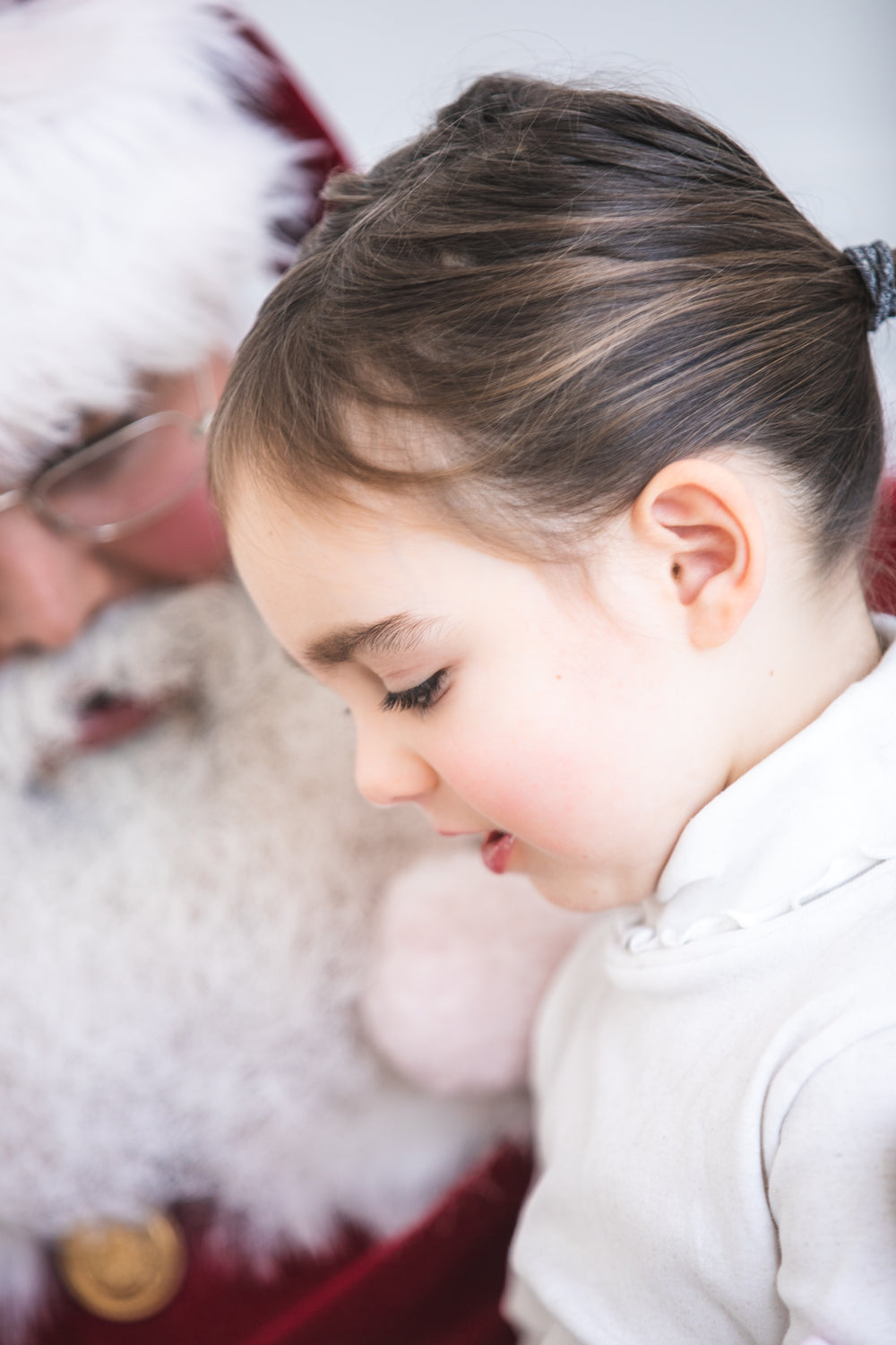 child with santa claus