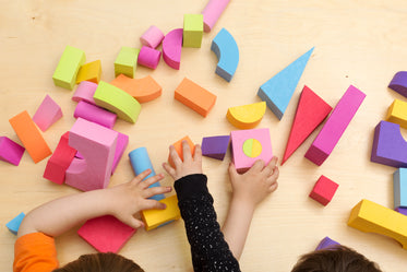 children sharing and playing with toys