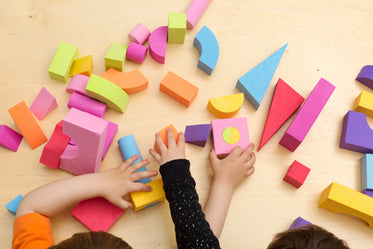 children sharing and playing with toys