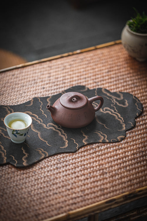 chinese tea set on bamboo table