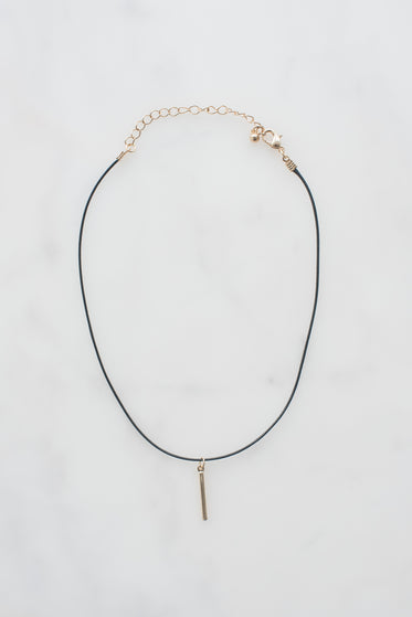 choker with gold pendant