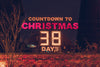 christmas countdown sign at night
