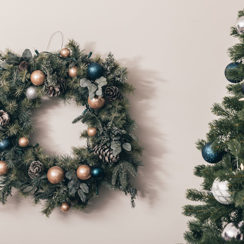 Christmas Wreath Hung By The Tree With Care
