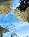 circular metal structure against a blue sky