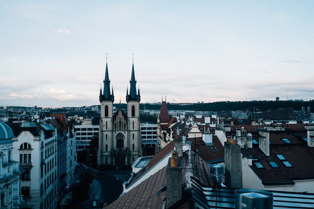 city buildings with a church in clear view between them