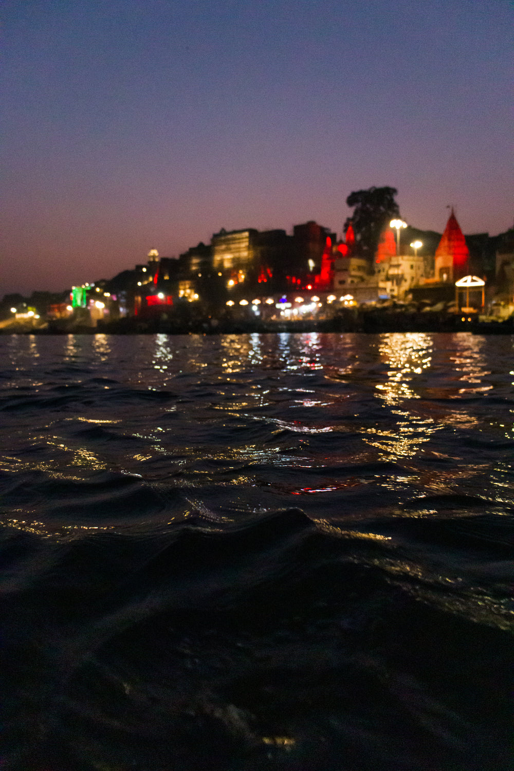 city lights reflected in water