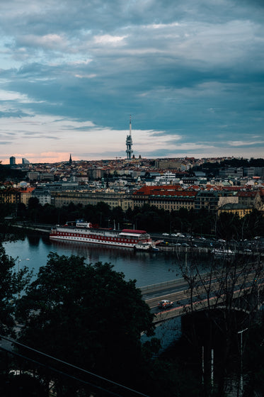 city on the river as the sun sets