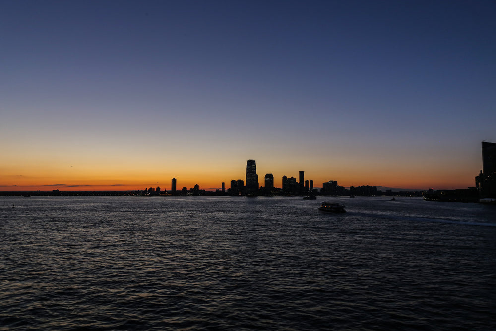 city sunset by the water