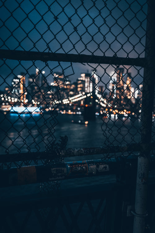 city through a fence