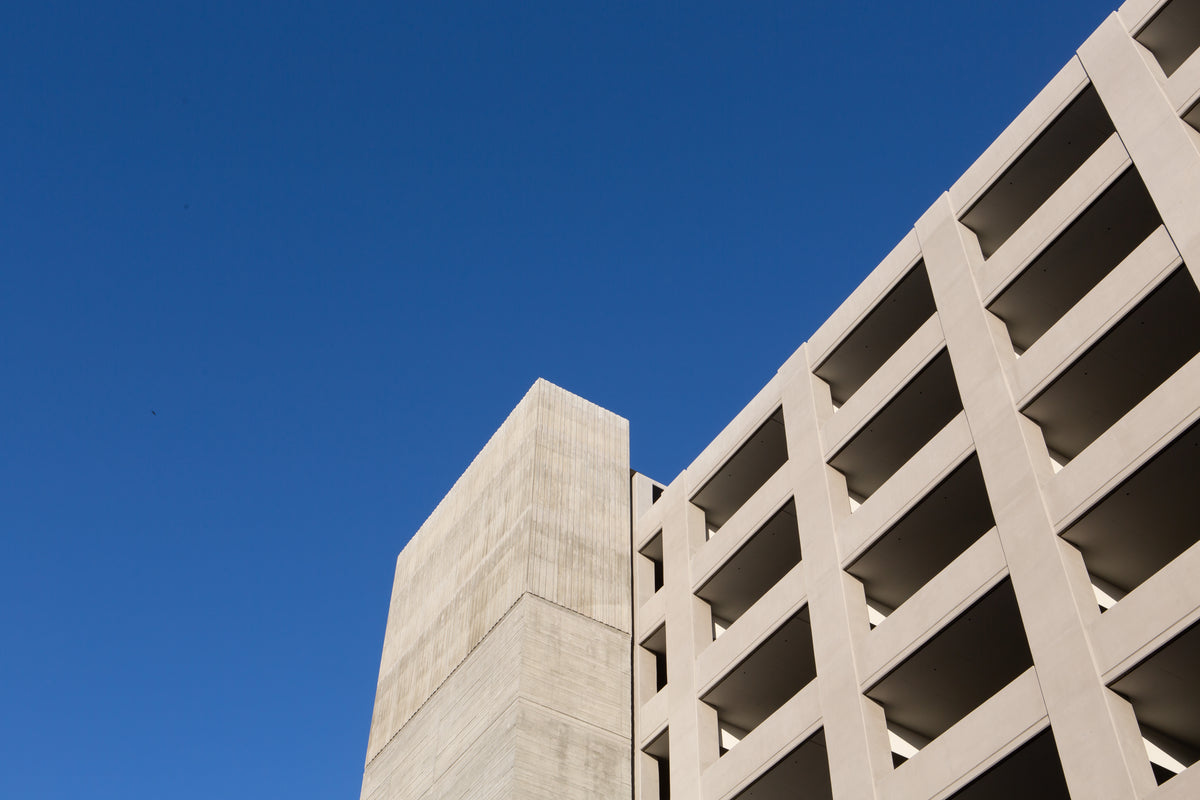 clear blue sky over parking structure