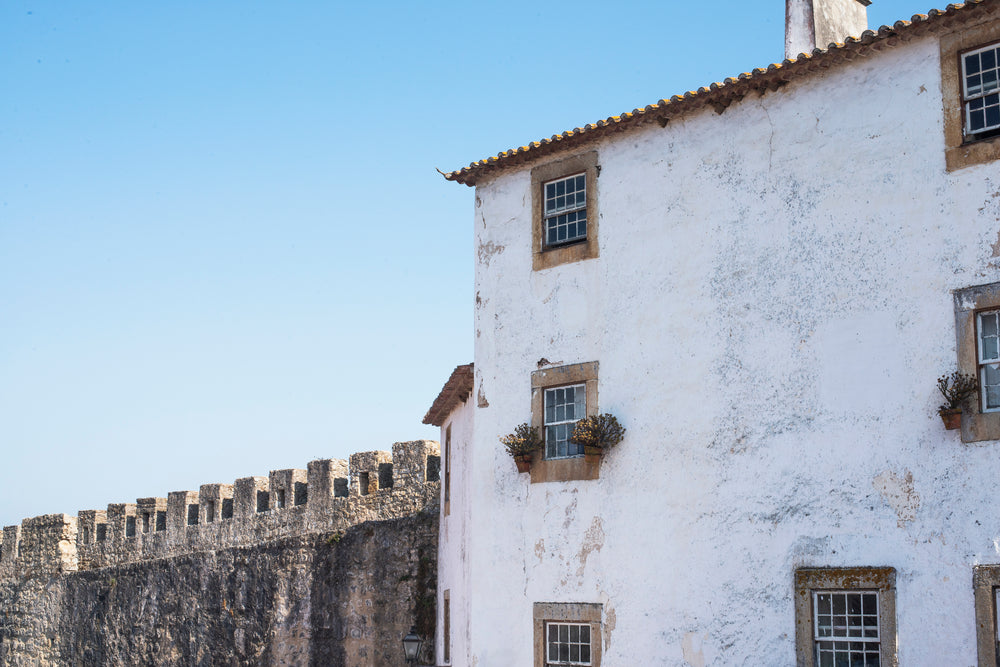 clear blue sky overlooking an old town building