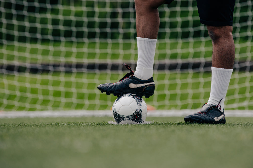 cleats on soccer ball