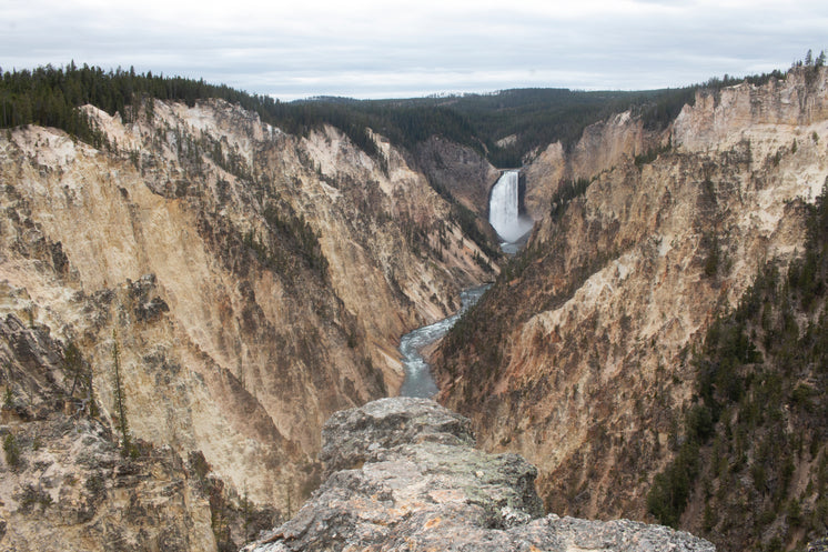 cliff-top-view-of-river-valley-and-waterfall.jpg?width=746&format=pjpg&exif=0&iptc=0