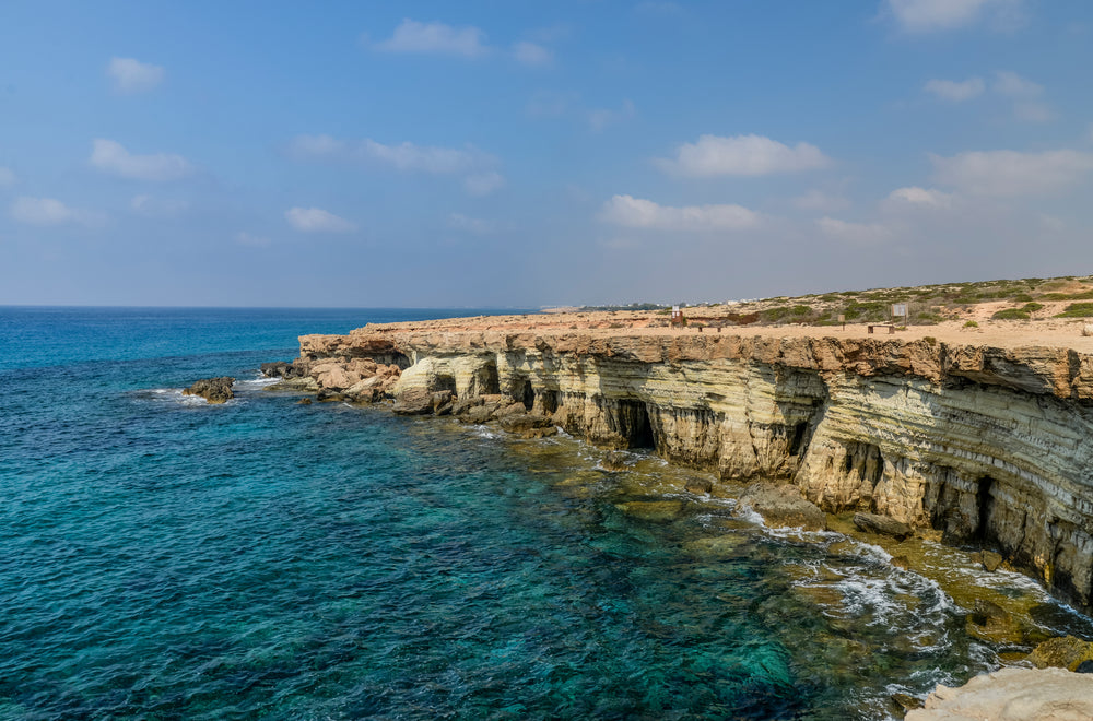 cliffs with crystal clear blue water below