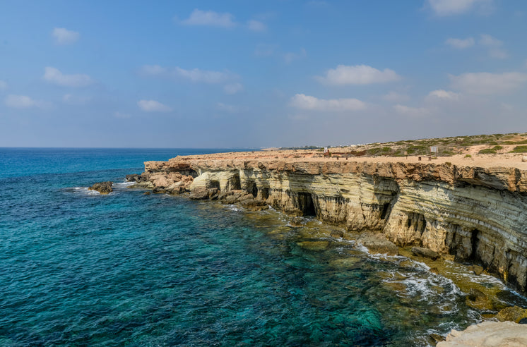 cliffs-with-crystal-clear-blue-water-bel