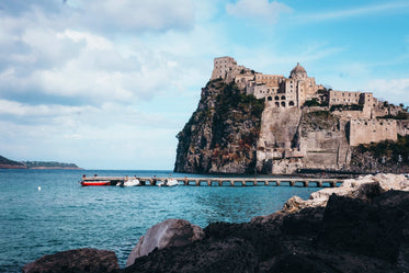 clifftop buildings over water