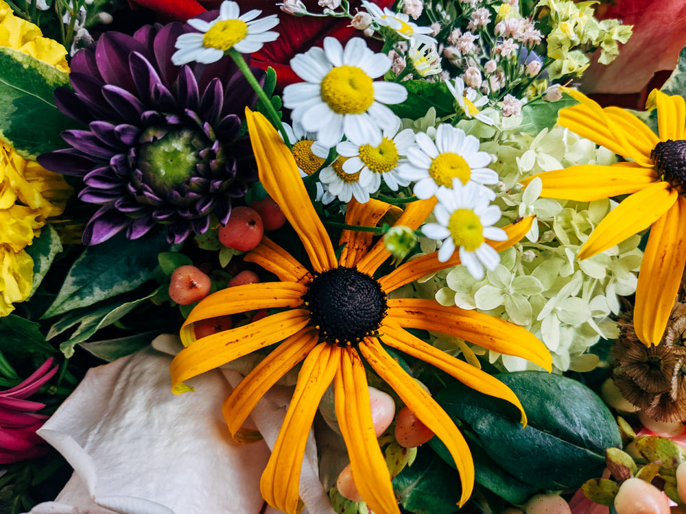 close up of a colorful flower bouquet in vibrant yellow