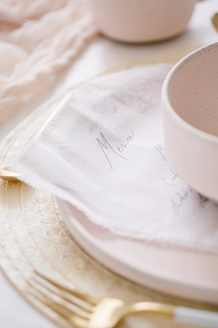 close-up-of-calligraphy-on-white-fabric.jpg?width=746&format=pjpg&exif=0&iptc=0