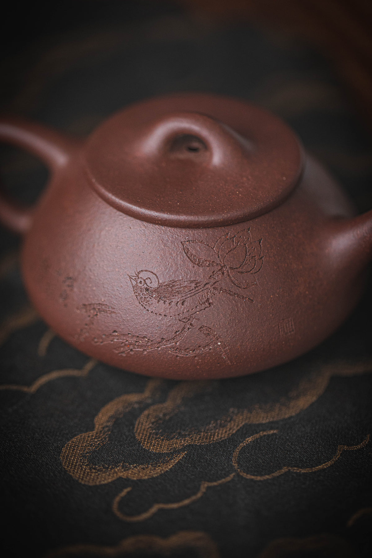 close up of chinese terracotta teapot